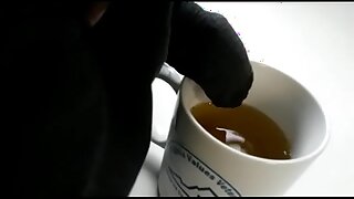 Pee in coffee mug in office