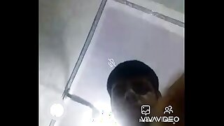 Indian shy guy hiding in shadows