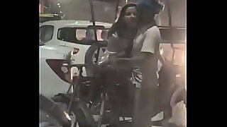 Women blowing a rickshaw puller